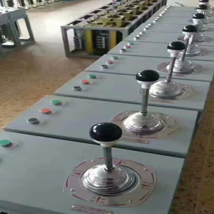 QT5-400/111聯(lián)動(dòng)控制臺(tái)可根據(jù)使用單位的要求來決定手柄位置和相應(yīng)機(jī)構(gòu)的觸頭分合程序